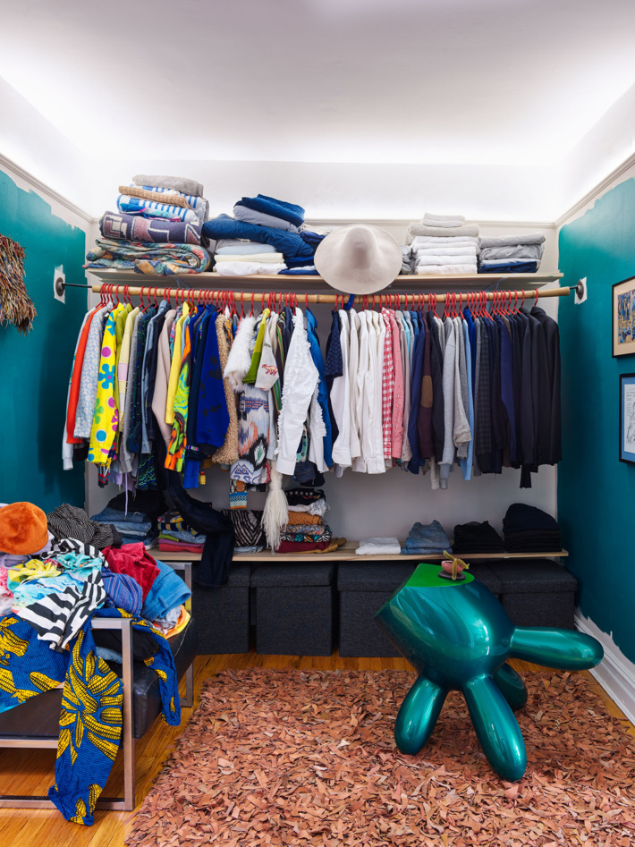 The closet is rather small yet crazy in its own way, too, there's much clothes and accessories