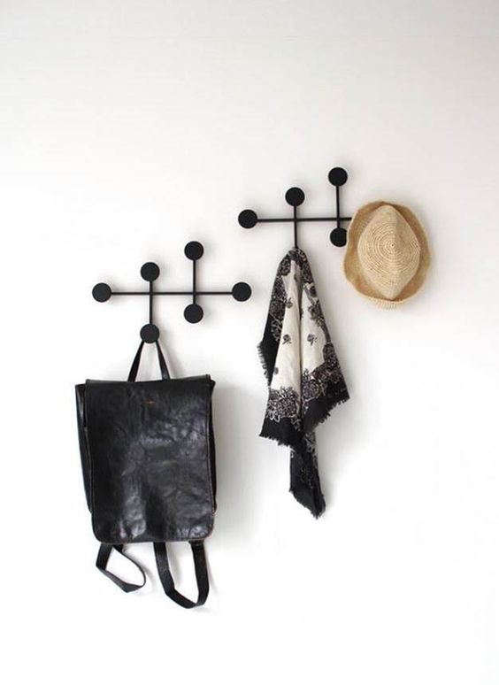 modern black metal dot coat racks that are wall-mounted are a great idea for a modern space