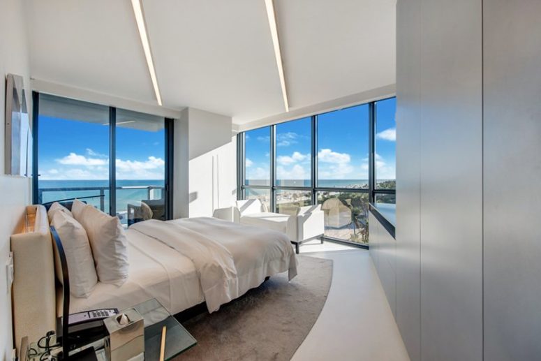 Another bedroom features a lot of storage and a comfy daybed to enjoy the views