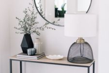 cute simple round mirror for an entryway