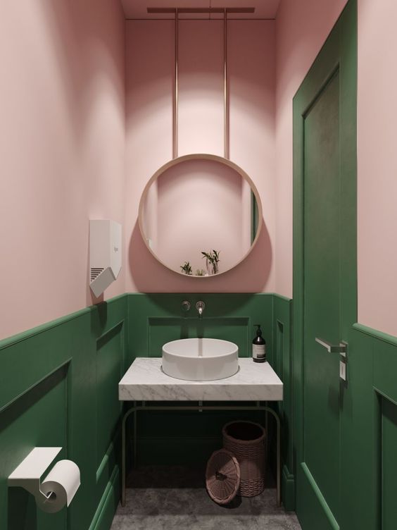 a combo of green and blush is a cool and bold idea to try in a bathroom or a powder room