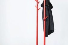 08 an ultra-modern coat rack of a concrete bowl and red metal trees – hang your clothes and accessories on them and put something into the bowl, too