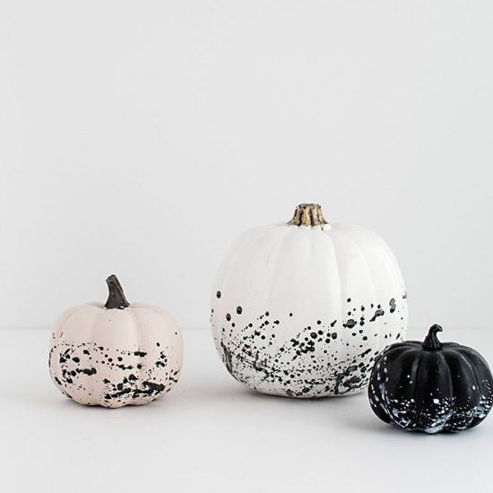 modern black and white splatter pumpkins can be easily DIYed for Halloween decor