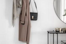 09 a comfy coat rack with loops and a wooden base looks ethereal and is great for hanging everything you want