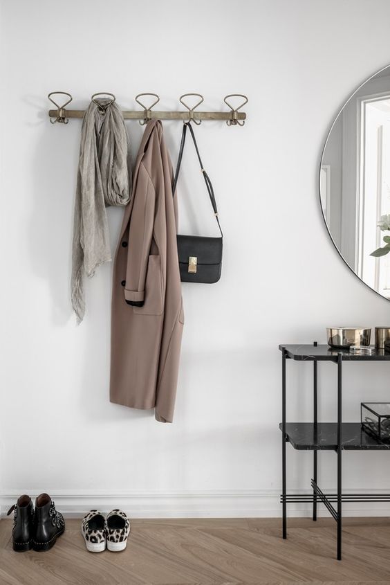 a comfy coat rack with loops and a wooden base looks ethereal and is great for hanging everything you want