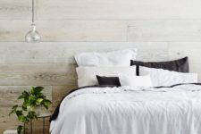 09 a cozy rustic bedroom with whitewashed walls and a floor – it’s a great base for adding warmth and coziness
