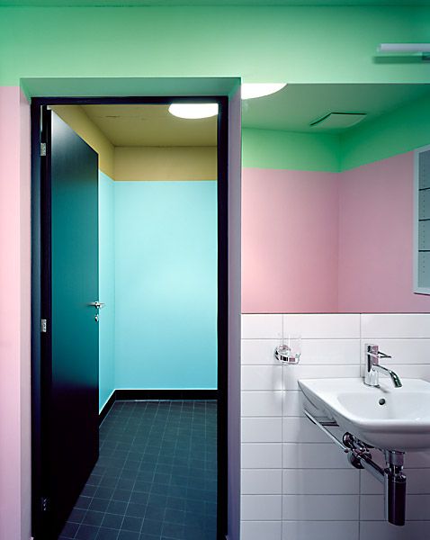 a mix of green and pink with a color block effect and some white tiles to make the look less crazy
