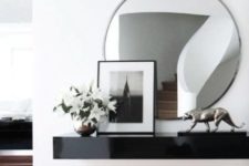 10 a black lacquered floating vanity is a chic and refined idea for a contemporary space