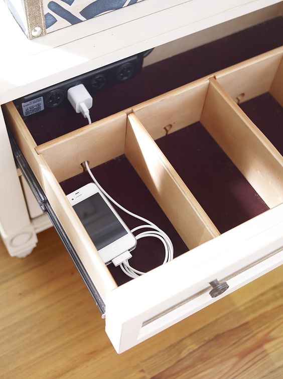 go for a hidden charging station like this one to make the space decluttered