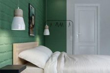 13 a minimalist bedroom with a sleeping zone accented with bright green color on the walls, ceiling and floor