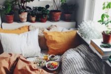 13 cozy bedding with orange and rust touches – pillowcases and a blanket for a fall space