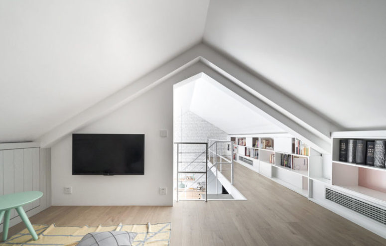 The upper floor features a TV watching space, too