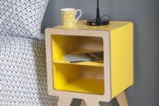14 a modern nightstand of yellow lacquer and plywood with open storage for a bold touch