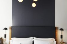 14 for making your space ultra-modern, just go for color blocking, like here a black headboard flowing into the wall and ceiling over the bed