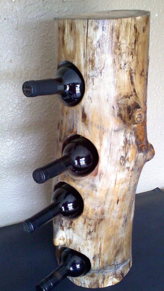 Make a simple wine bottle holder like this one to store the bottles   such craft won't take much time