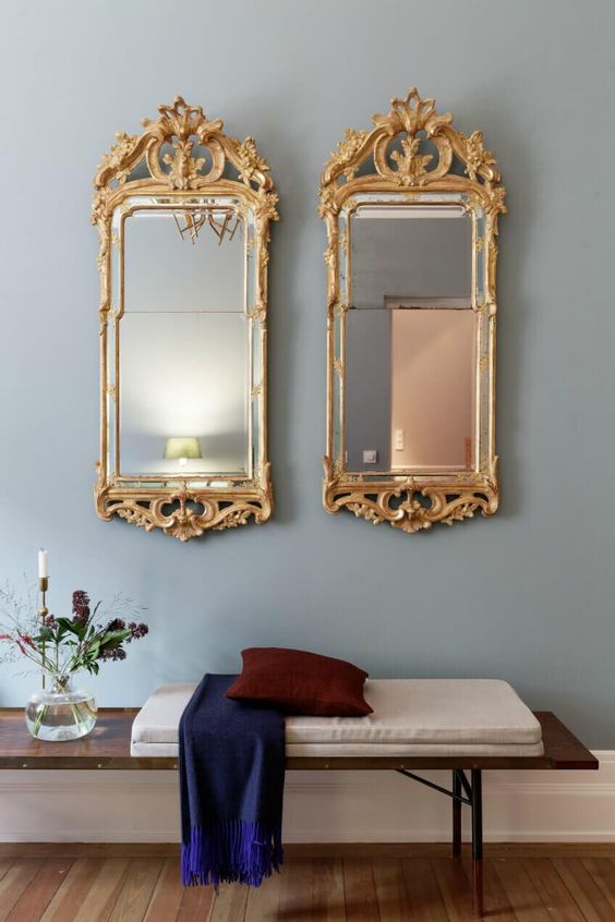 a duo of mirrors with gold vintage frames will bring a gorgeous exquisite feel to your space