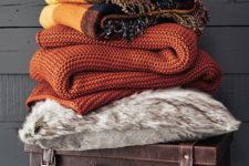 15 bring colorful blankets and a faux fur throw to your bedroom to add texture and interest plus coziness