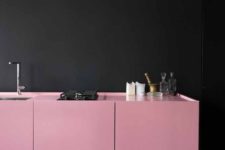 16 a contemporary kitchen with only lower cabinets in bold pink and a black wall for a juxtaposition
