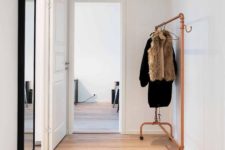 16 a free-standing coat rack made only of piping is a bright modern solution, and copper is very trendy now