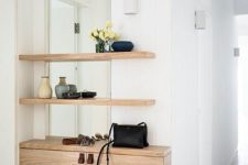 16 a plywood console and a duo of matching shelves over the console for a comfy contemporary space