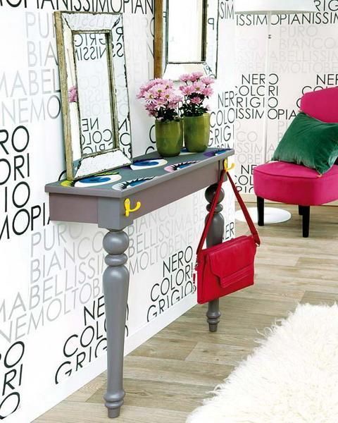 cut a vintage table in halves and spruce it up with bold stencils, decals or painting