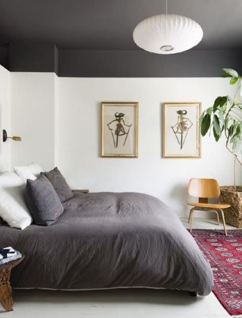 a monochromatic space is spruced up with color blocking on the ceiling and matching bedding