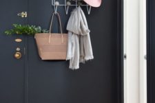 17 a ultra-modern metal coat rack with dots is comfy for hanging everything you want and doesn’t require much space