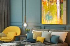 18 a bright yellow chair, a pillow and a bold artwork with yellow as the main shade for a luxurious bedroom
