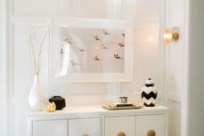 18 a refined floating console table in white and gold for a luxurious or glam entryway