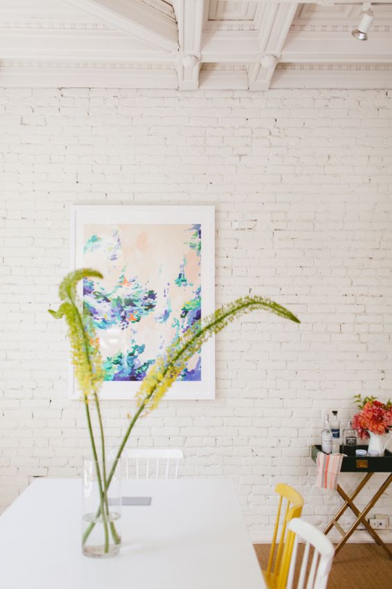 Add interest to the space with brick walls and make them less rough and harsh with whitewashing
