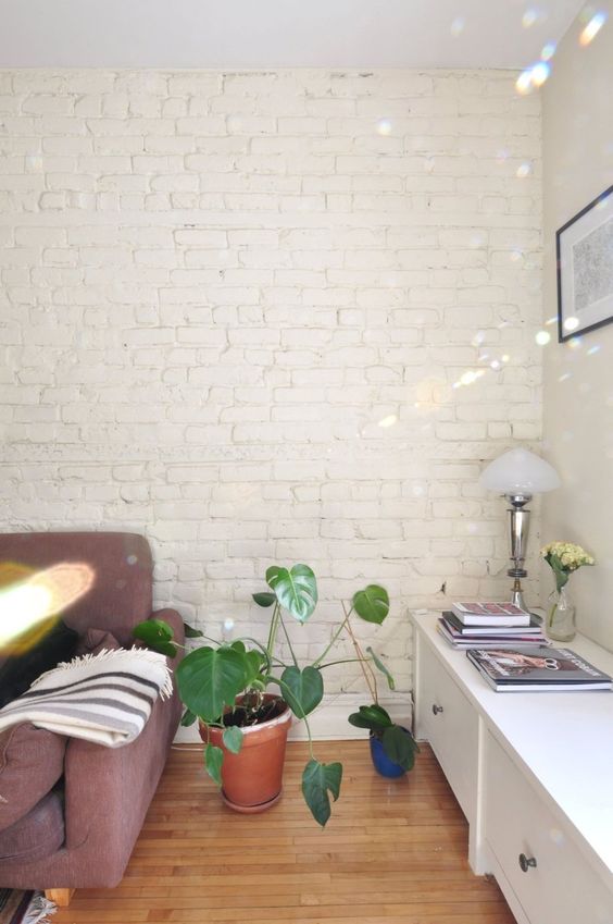 A whitewashed brick wall is a chic idea for any room to make an accent or to create a neutral backdrop for decor