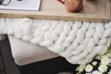 20 a chunky knit white blanket and copper mugs on a wooden tray are great for fall bedroom decor