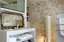 21 a whitewashed stone wall is a great accent for any bathroom, it brings a natural feel