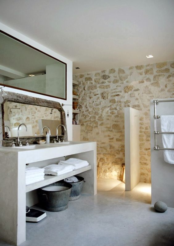 A whitewashed stone wall is a great accent for any bathroom, it brings a natural feel