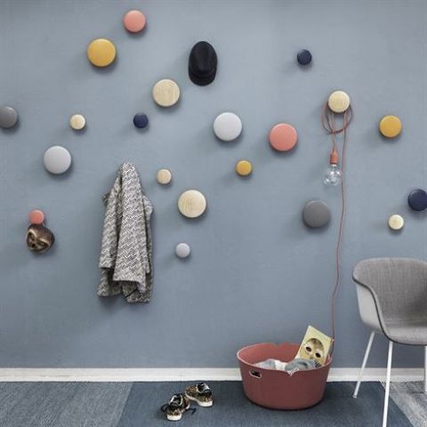 attach some colorful dot hooks of different sizes to the wall to make hanging pieces whimsical and cool