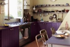 22 purple cabinets plus beige walls create a bold contrast and eye-catchiness in the space