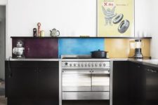24 a black kitchen is spruced up with a bold idea, a color block kitchen backsplash