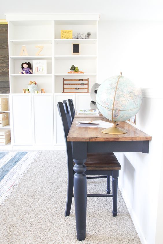 an old kitchen table turned into a double desk for a kids' room