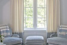 24 color block curtains in cream and powder blue matches the color palette and adds an edgy feel