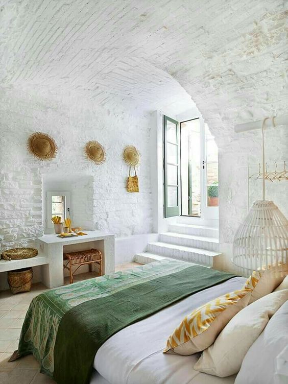 Whitewash your whole space including the ceiling to make it airy and serene