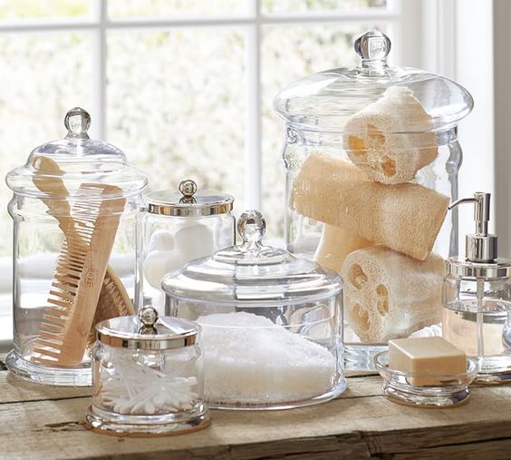 classic glass containers with lids are ideal for storing bathroom stuff