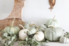 02 a fresh natural mantel with eucalyptus and heirloom pumpkins for a beautiful Thanksgiving mantel