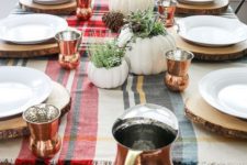 02 copper glasses of a whimsy shape and a matching pitcher spruce up the simple rustic tablescape