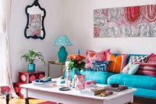 03 a bold living room with many printed textiles, pillows, artworks and chic furniture