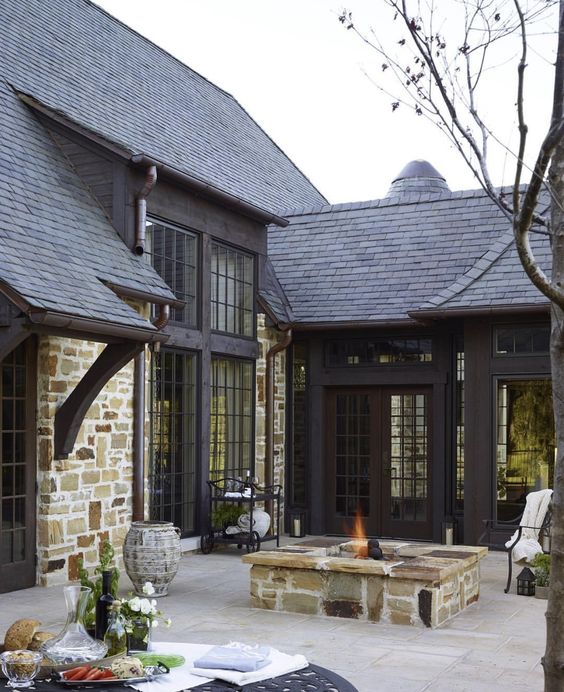 paint your historic cottage black to give it a more modern feel yet preserve the original brick or stone cladding
