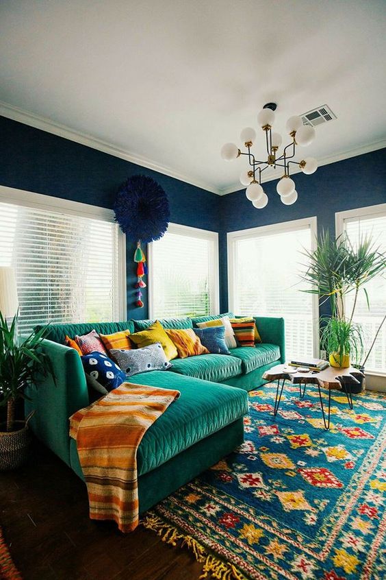 navy as a basic color, emerald and yellow touches plus mid-century modern furniture