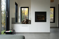 07 Glass firewood storage is a great idea to add coziness to the space while being useful at the same time