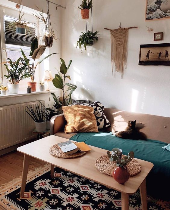A boho space with a bright printed rug that adds a more free spirited feel to the space