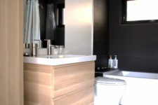 minimalist bathroom design in black, white and wood
