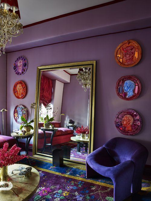 a bright boho space in purple, fuchsia, pink and blue and lots of gilded touches